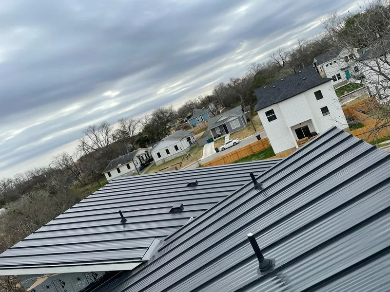 Standing seam metal roof panels with vents for Skylight Repair in Euclid